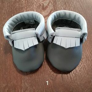Gray and blue baby moccasins